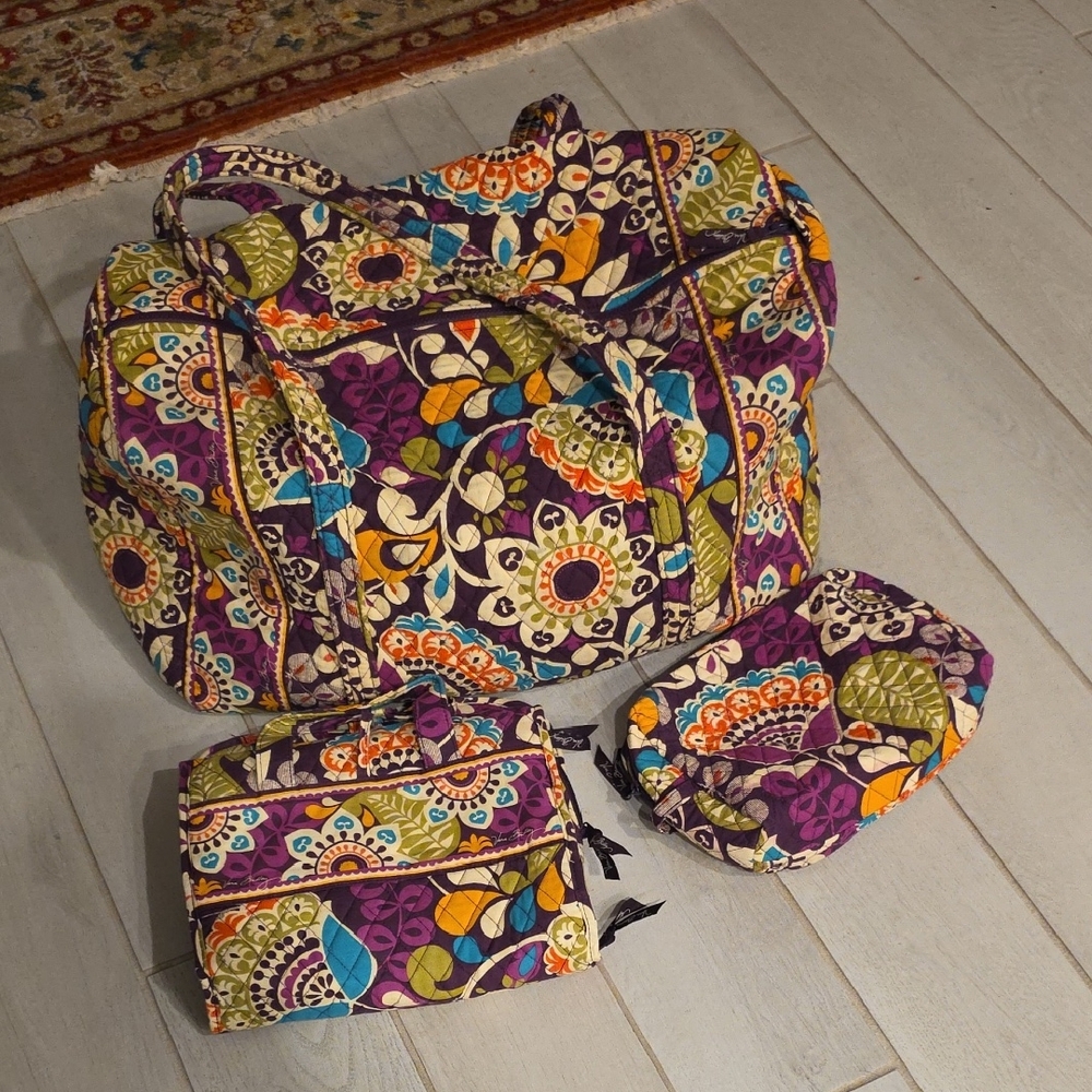 Vera Bradley bags in the retired Plum Crazy pattern, 2013